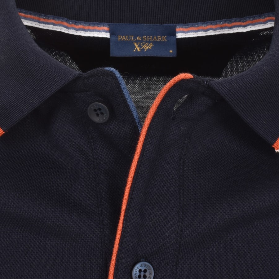 Orange paul and shark polo top